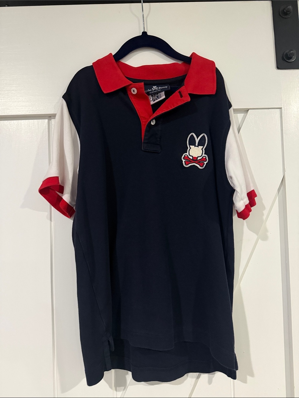 Psycho Bunny Navy Polo with Red Collar and White Sleeves